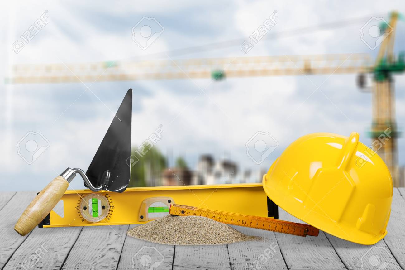 Standard construction safety and construction site background.